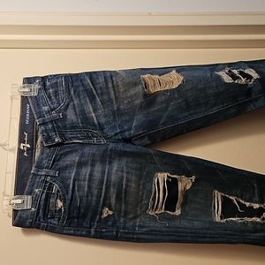 Blue distressed jeans